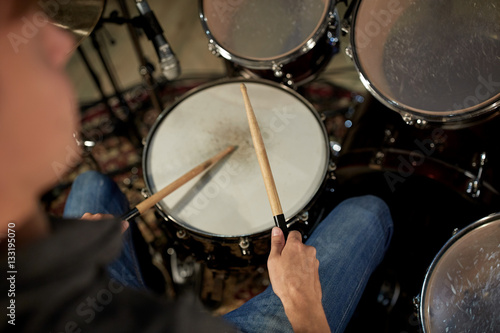 Fotografia, Obraz man playing drums at concert or music studio