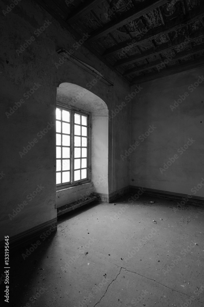 old abandoned room with window - black and white