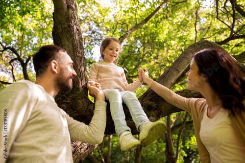 happy family in summer park having fun