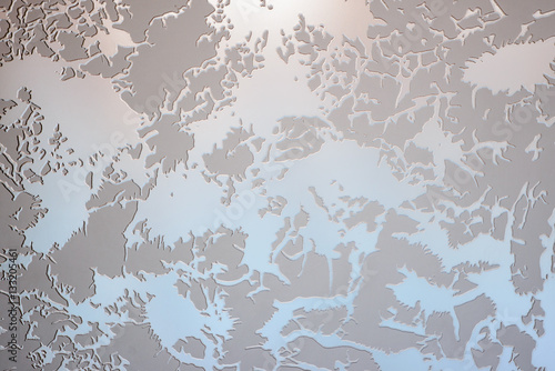 The sun is shining through the frosted glass