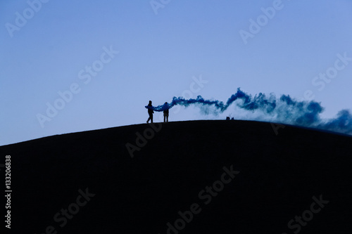 young rebels - blue smoke silhouette photo