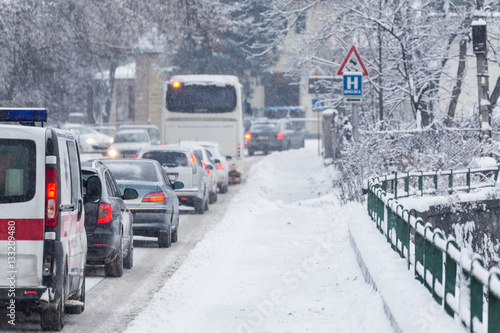 Traffic jam in the middle of winter. Snow calamity.
