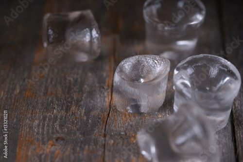 Ice cubes on wooden background