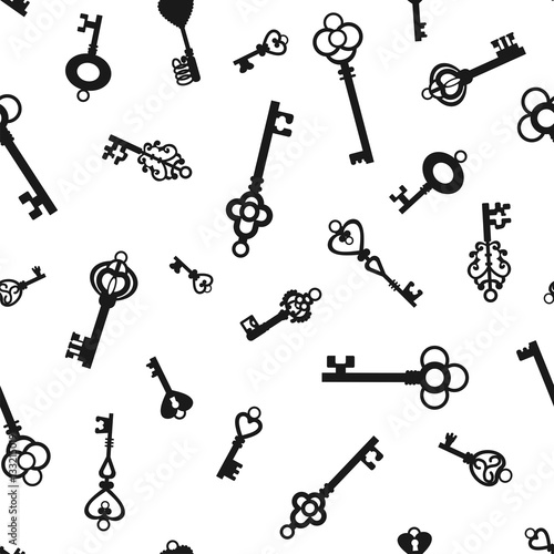 Vintage keys on  white background.  Seamless pattern silhouette. Vector illustration.