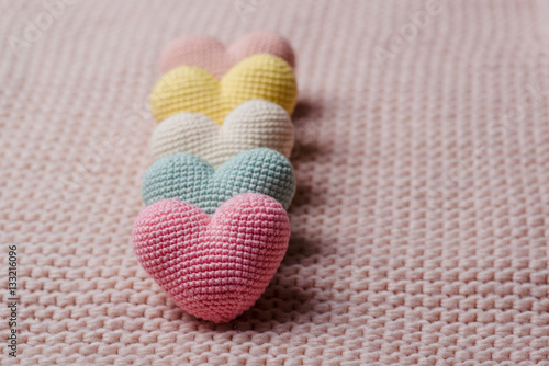 Heap of knitted hearts . Background Valentines Day.Valentines day cards.