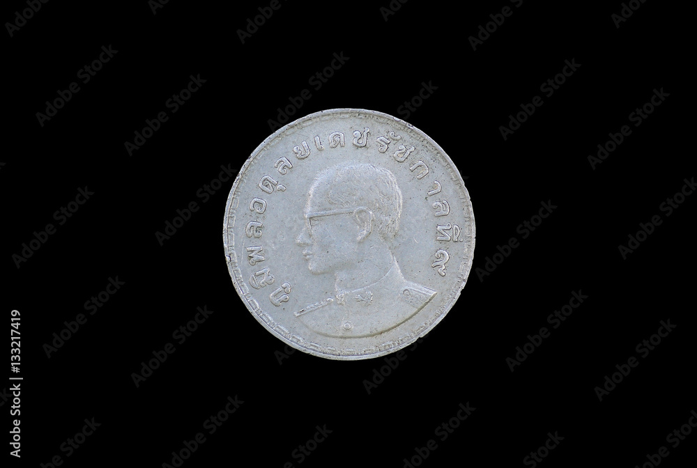 Old Coin of Thailand isolated on white background, King Bhumibol Adulyadej of Thailand depicted in the Thai coin. Old Coin of Thailand isolated on white background, King Bhumibol Adulyadej of Thailand depicted in the Thai coin.