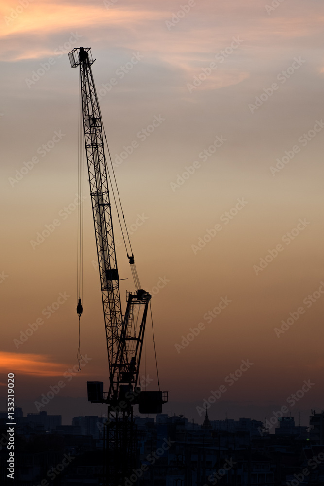 Constrion crane at sunset