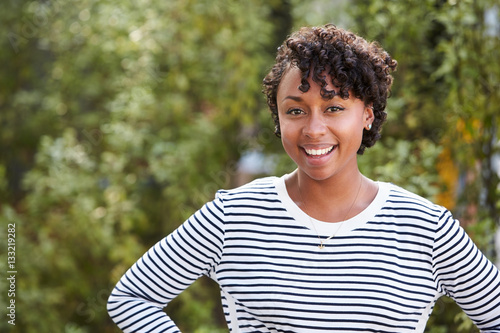 Smiling young mixed race woman, horizontal