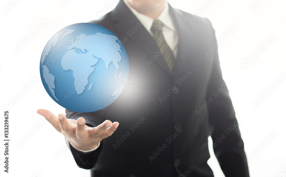 Businessman holding Earth graphic on hand , communication and ne Businessman holding Earth graphic on hand , communication and ne