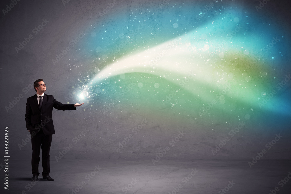 Businessman holding light