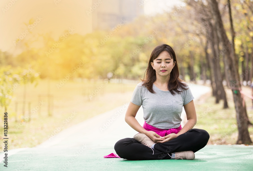 woman posing in sit meditation woman posing in sit meditation