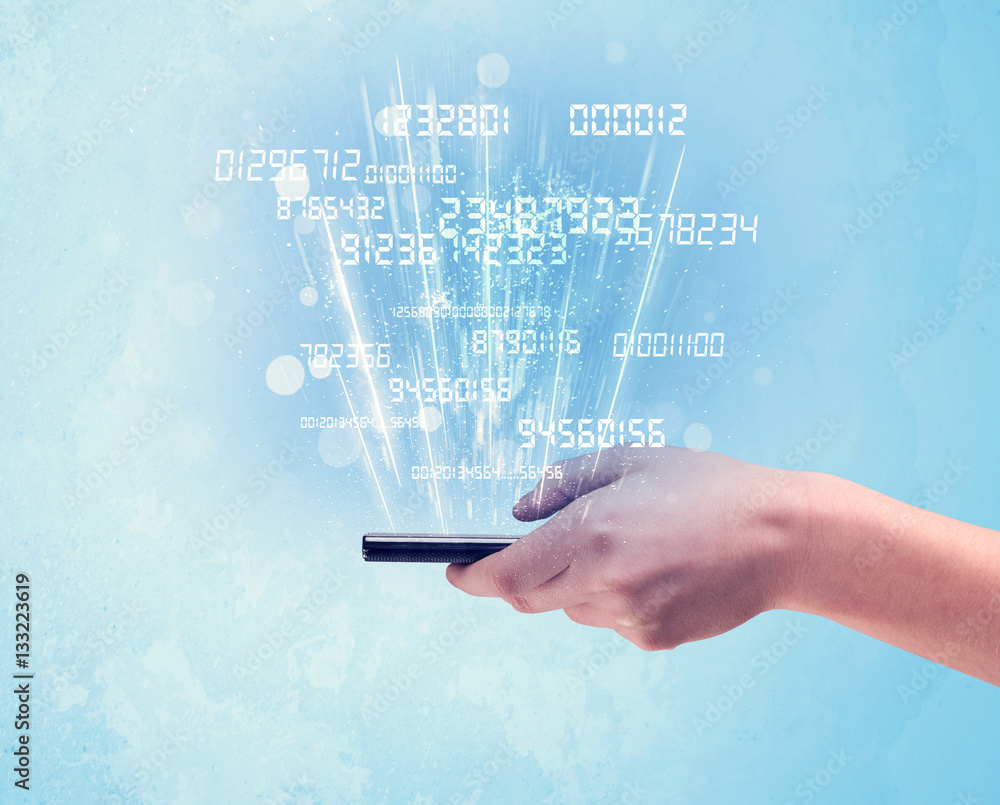 Hand holding phone with digital numbers Hand holding phone with digital numbers