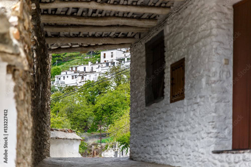 View of the bottom of a street, in a village of La Alpujarra, Gr