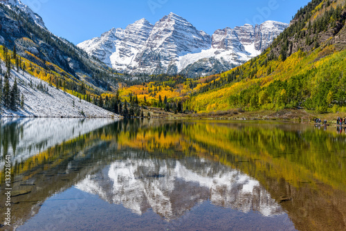 Autumn Mountain Lake - Autumn view of snow coated Maroon Bells and crystal clear Maroon Lake  Aspen  Colorado  USA.