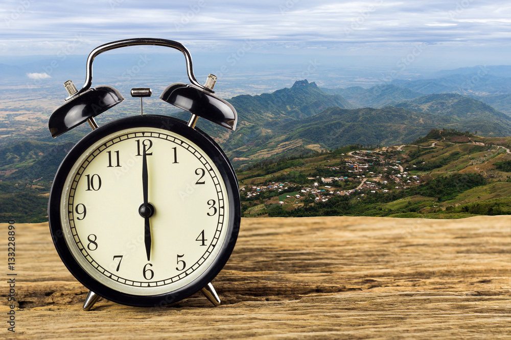 Clock with a view of the Mountain road background Stock Photo | Adobe Stock