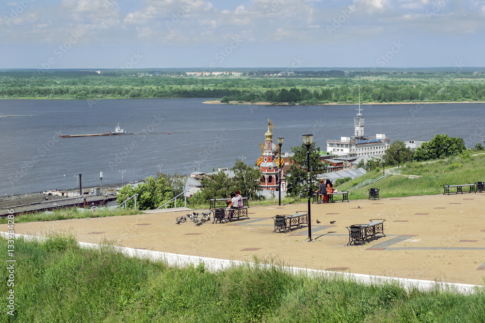 Fototapeta premium View on the Volga river, river station and the Stroganov Church. Nizhny Novgorod, Russia