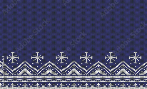 Knitted seamless pattern with stripes, zigzags and snowflakes - white on a dark blue background. Ornament included in swatches  panel.