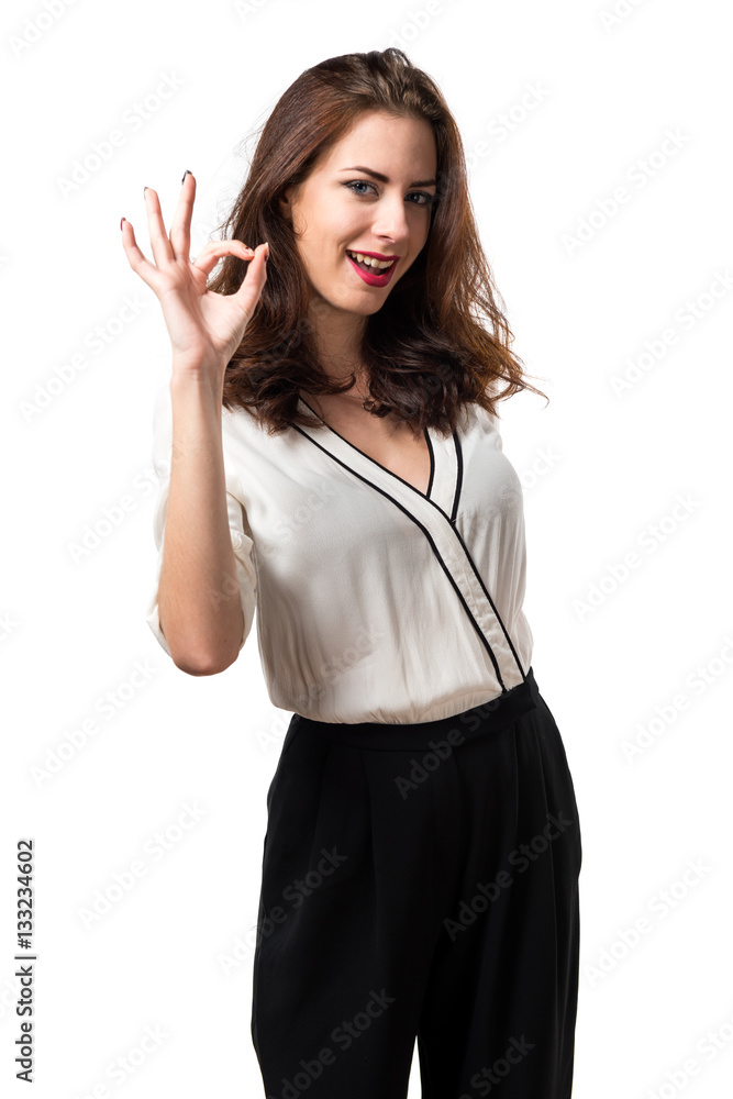 Beautiful brunette girl making OK sign Beautiful brunette girl making OK sign