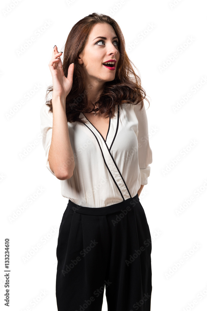 Beautiful brunette girl with his fingers crossing Beautiful brunette girl with his fingers crossing