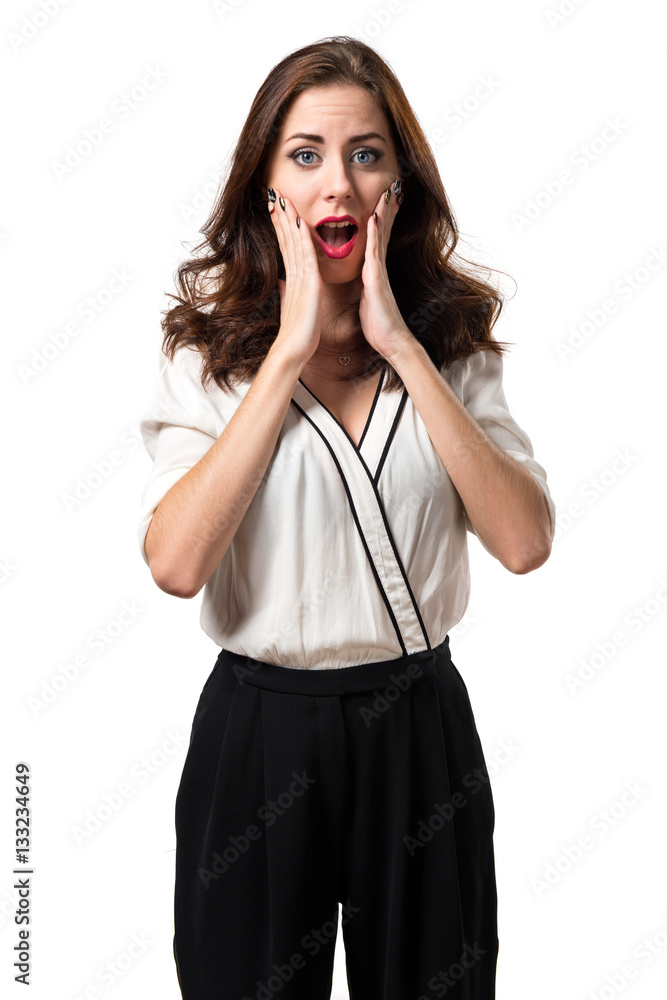 Fototapeta premium Beautiful brunette girl making surprise gesture