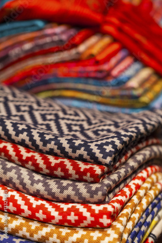 Colorful silk and wool scarfs in a market
