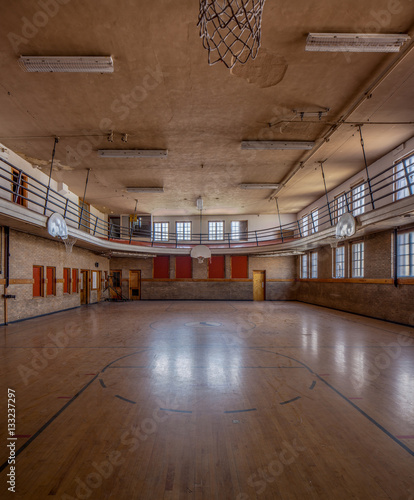 Interior view of disused YMCA gym court photo