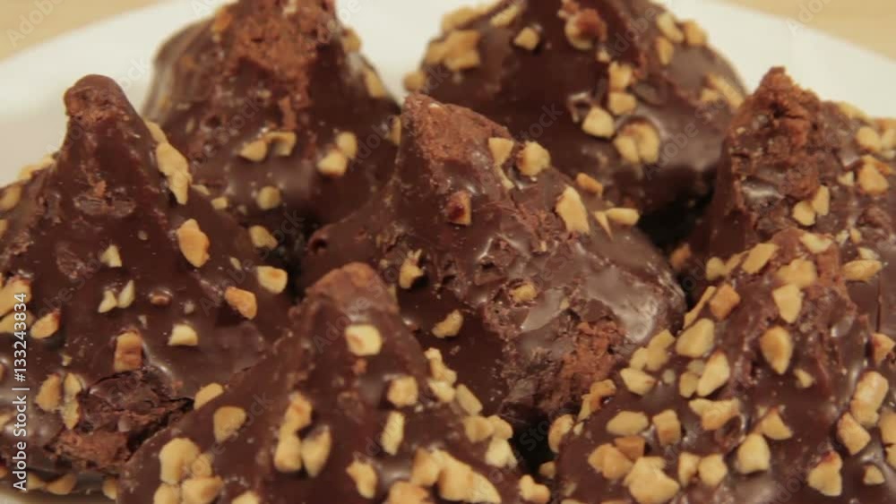 Dark chocolate cookies with nuts and delicate filling Dark chocolate cookies with nuts and delicate filling