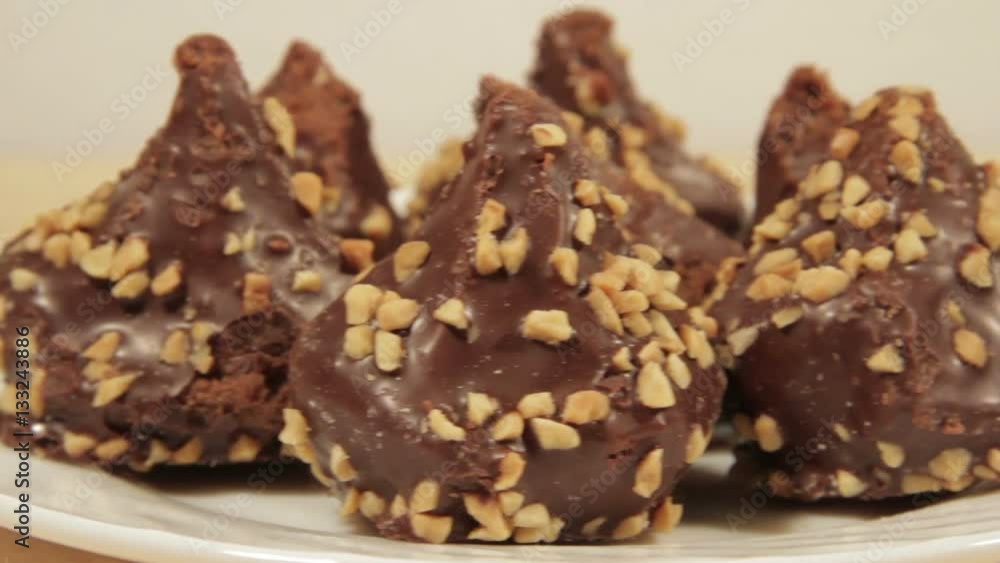 Dark chocolate cookies with nuts and delicate filling Dark chocolate cookies with nuts and delicate filling