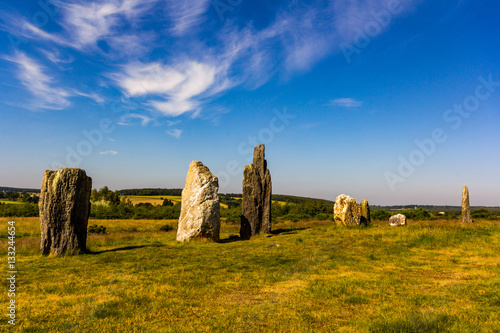 Standing stones in a grassy fields in Brittany, North west Franc