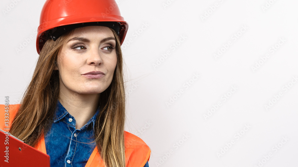 Woman engineer construction builder in helmet. Woman engineer construction builder in helmet.