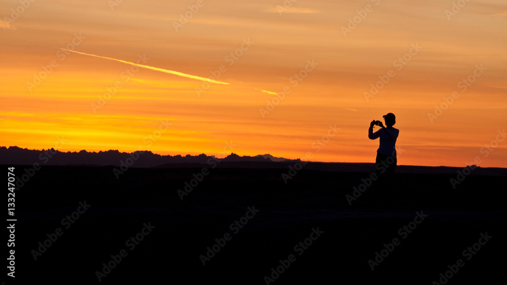 Fototapeta premium photographer at sunset