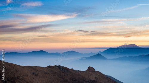 Mountain silhouette and stunning sky at sunset