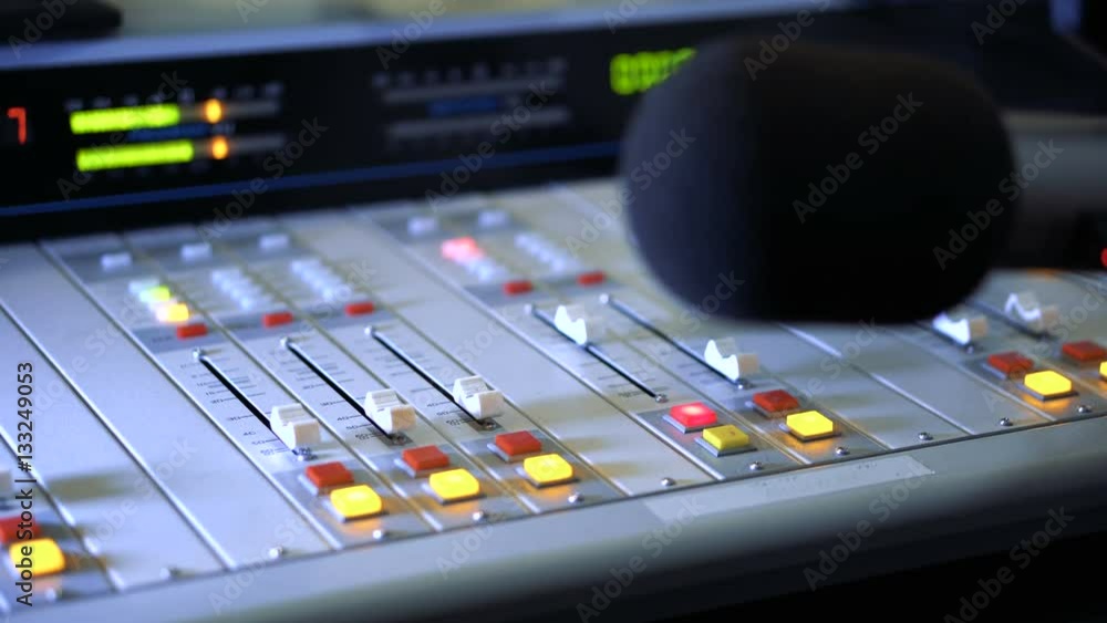 Sound mixer and microphone in the broadcasting studio on radio