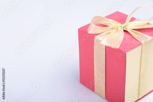 Gift boxes with bow on wood background