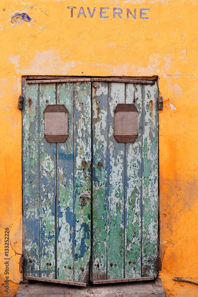 Closed door of Taverne des Boucaniers. Goree-Senegal. 1727