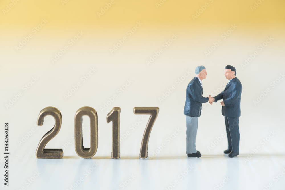 business miniature people with new year 2017 business miniature people with new year 2017