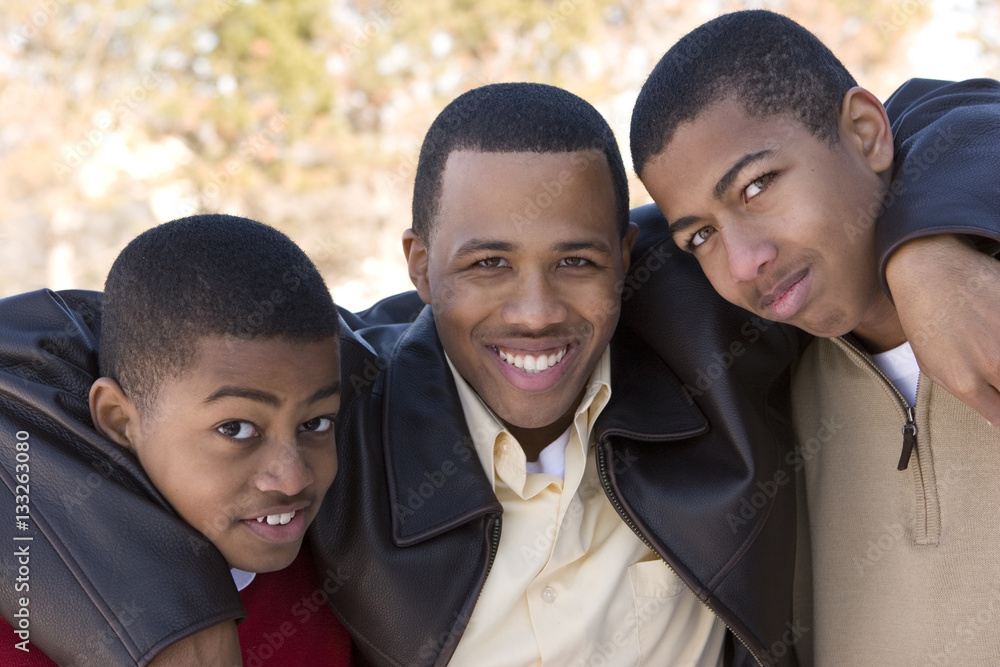 Portrait of African American teenage brothers smiling. Portrait of African American teenage brothers smiling.