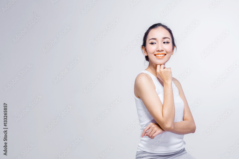 Beautiful woman cares for the skin face - posing at studio isola Beautiful woman cares for the skin face - posing at studio isola