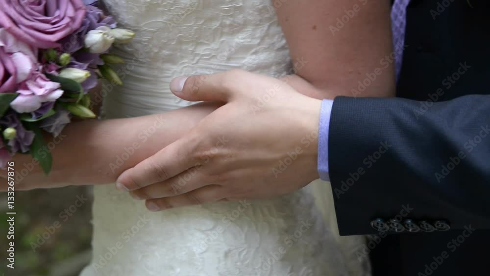 couple embracing on wedding day couple embracing on wedding day