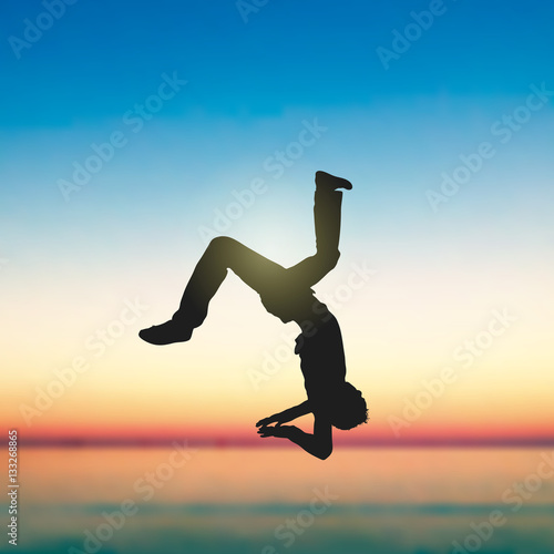 Somersault, Sunset, Seaside  photo