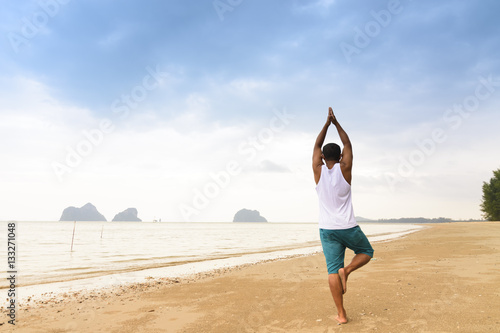 Man exercising or yoga with sea view,Or Man is activities for health and nature view
