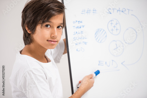 Kid with white board