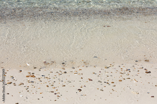sand colored pebbles on the beach