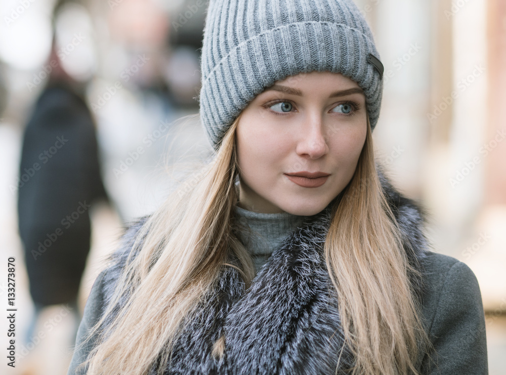 Portrait of young woman at sunny winter day. Portrait of young woman at sunny winter day.