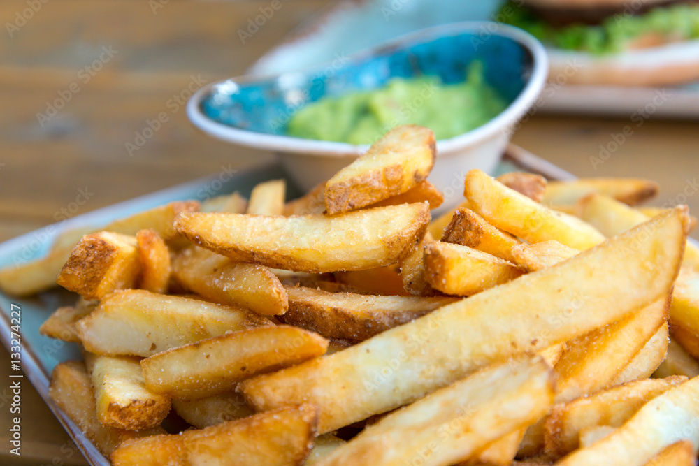 Golden French fries potatoes ready to be eaten Golden French fries potatoes ready to be eaten