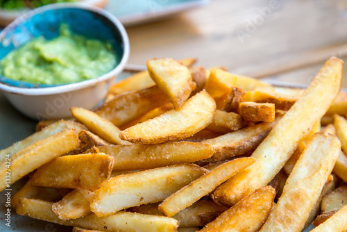 Golden French fries potatoes ready to be eaten