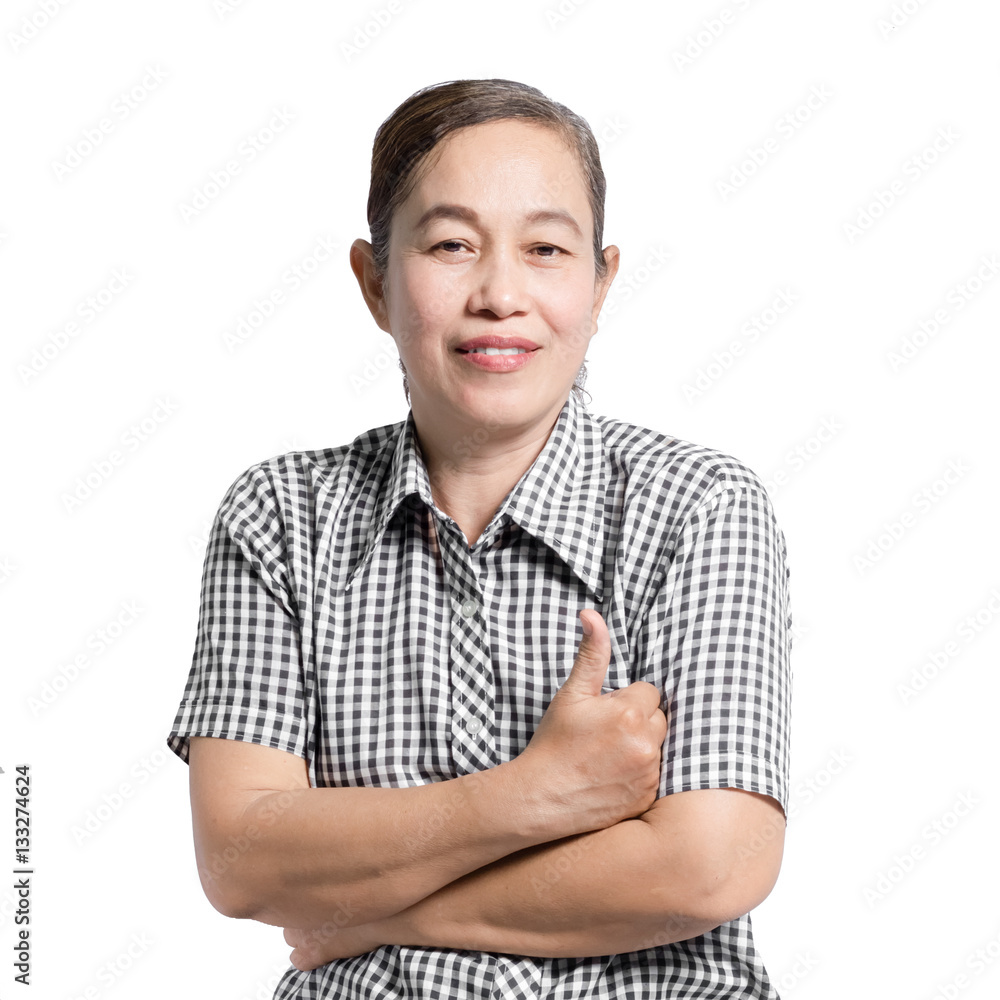Portrait of a mature woman smiling and showing thumb up. Isolate Portrait of a mature woman smiling and showing thumb up. Isolate