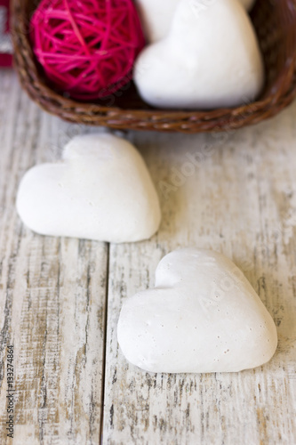 Gingerbread hearts on a wooden background