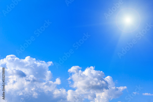 The vast blue sky and clouds sky with sunshine on sunny summer or spring day.