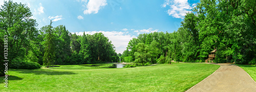 Fototapeta Naklejka Na Ścianę i Meble -  Lake and side walk in the spring park